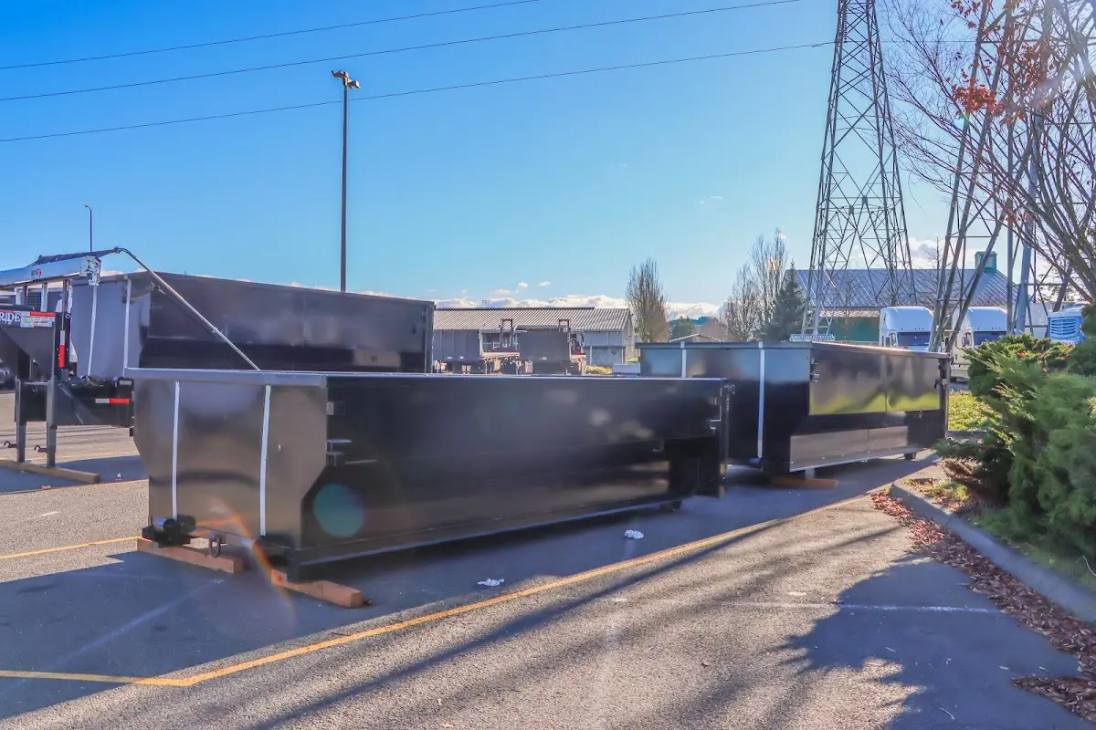 Roll-off dumpster ready for waste disposal at job site for 2 Yard Dumpster Rental in West Windsor